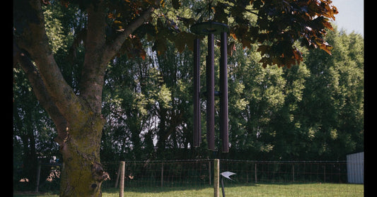 Biblical Bells Wind Chime Hanging from Tree