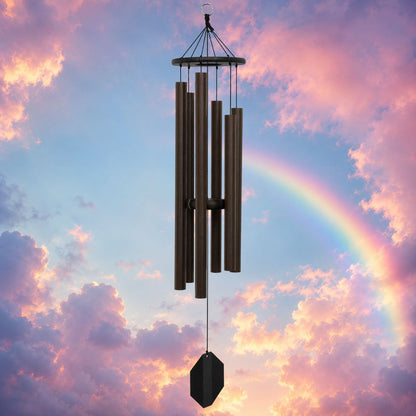 King David's Harp 41-inch Biblical Bells wind chime against rainbow sunset sky #41" - King David's Harp