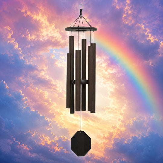 Melody of the Heart 37-inch Biblical Bells wind chime against rainbow sunset sky #37" - Melody of the Heart