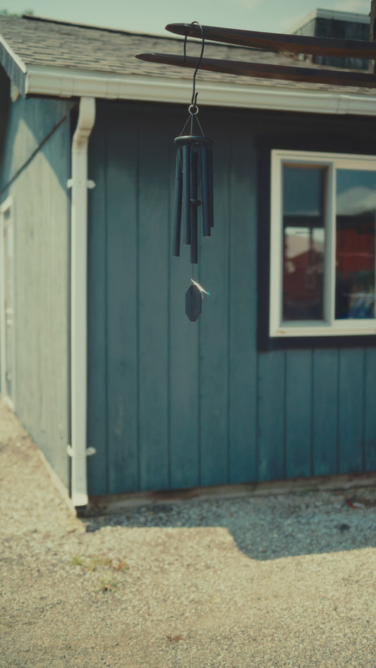 Video preview of the Whispers in the Wind series wind chimes, showcasing handcrafted, soft-toned chimes that produce delicate melodies. These Amish-made instruments feature weather-resistant black aluminum tubes and are ideal for small gardens and balconies.